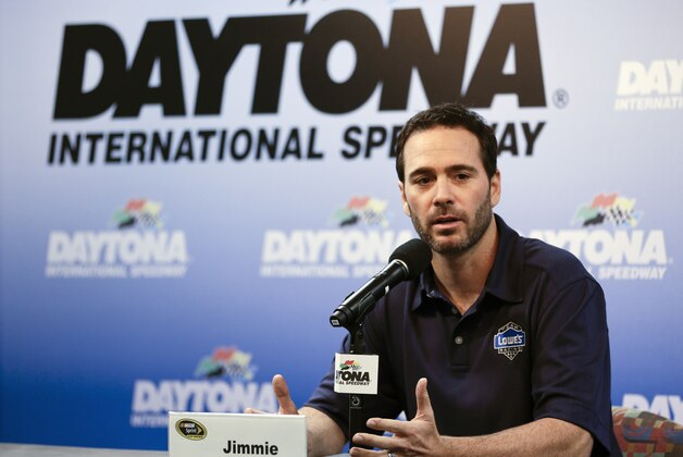 NASCAR driver Jimmie Johnson at a news conference at Sprint Cup auto racing testing at Daytona International Speedway in Daytona Beach, Fla., Thursday, Jan. 9, 2014.(AP Photo/John Raoux)