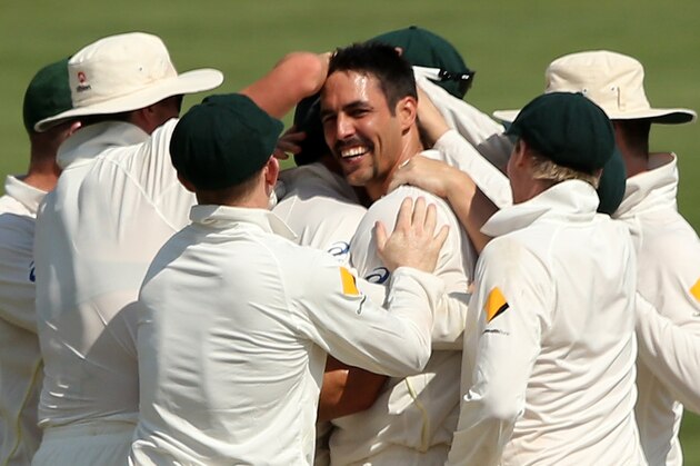 CENTURION, SOUTH AFRICA - FEBRUARY 15: Mitchell Johnson of Australia is congratulated by teammates after he dismissed JP Duminy of South Africa during day four of the First Test match between South Africa and Australia on February 15, 2014 in Centurion, South Africa.  (Photo by Morne de Klerk/Getty Images)