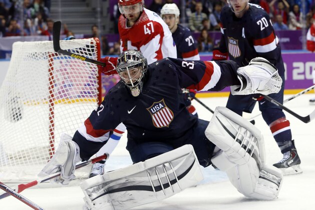 USA goaltender Jonathan Quick comes out of the crease to defend the goal in the third period of a men's ice hockey game at the 2014 Winter Olympics, Saturday, Feb. 15, 2014, in Sochi, Russia. (AP Photo/Mark Humphrey)