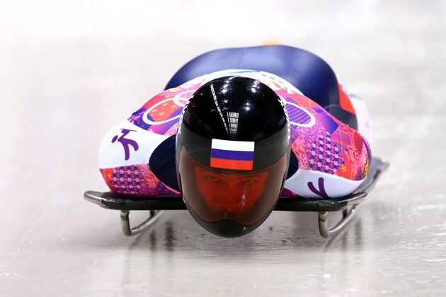 SOCHI, RUSSIA - FEBRUARY 15:  Alexander Tretiakov of Russia makes a run during the Men's Skeleton on Day 8 of the Sochi 2014 Winter Olympics at Sliding Center Sanki on February 15, 2014 in Sochi, Russia.  (Photo by Cameron Spencer/Getty Images)