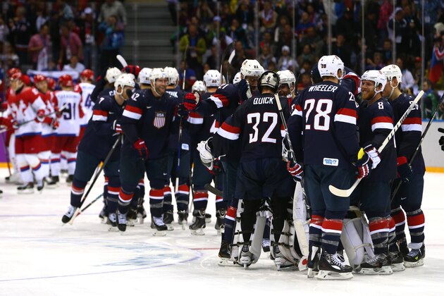 SOCHI, RUSSIA - FEBRUARY 15:  The United States celebrate after defeating Russia in a shootout during the Men's Ice Hockey Preliminary Round Group A game on day eight of the Sochi 2014 Winter Olympics at Bolshoy Ice Dome on February 15, 2014 in Sochi, Russia.  (Photo by Streeter Lecka/Getty Images)