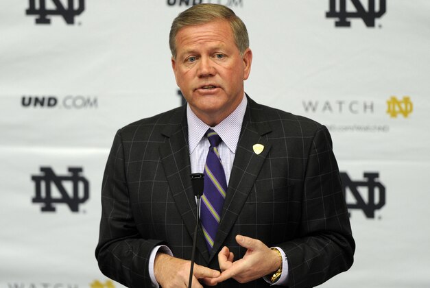 Notre Dame football coach Brian Kelly talks about recruits during football signing day at Notre Dame Feb. 5, 2014 in South Bend, Ind.  (AP Photo/Joe Raymond)