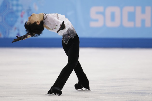 Yuzuru Hanyu of Japan competes in the men's free skate figure skating final at the Iceberg Skating Palace during the 2014 Winter Olympics, Friday, Feb. 14, 2014, in Sochi, Russia. (AP Photo/Bernat Armangue)
