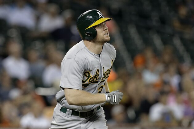 Oakland Athletics' Brandon Moss watches his three-run home run against the Detroit Tigers in the eighth inning of a baseball game in Detroit, Wednesday, Aug. 28, 2013. (AP Photo/Paul Sancya) Oakland Athletics' Brandon Moss watches his three-run home run against the Detroit Tigers in the eighth inning of a baseball game in Detroit, Wednesday, Aug. 28, 2013. (AP Photo/Paul Sancya)