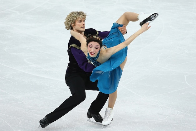SOCHI, RUSSIA - FEBRUARY 09:  Meryl Davis and Charlie White of the United States compete in the Team Ice Dance Free Dance during day 2 of the Sochi 2014 Winter Olympics at Iceberg Skating Palace  at Iceberg Skating Palace on February 9, 2014 in Sochi, Russia.  (Photo by Robert Cianflone/Getty Images)
