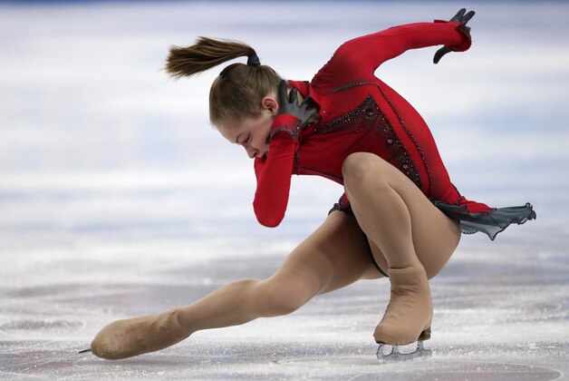 Julia Lipnitskaia of Russia competes in the women's team free skate figure skating competition at the Iceberg Skating Palace during the 2014 Winter Olympics, Sunday, Feb. 9, 2014, in Sochi, Russia. (AP Photo/Bernat Armangue)
