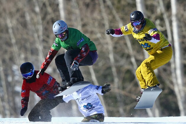 ASPEN, CO - JANUARY 24:  Lindsey Jacobellis (R) of the United States races for the lead with Maelle Ricker of Canada (L) in their semifinal heat of the women's Snowboarder X during Winter X-Games 2014 Aspen at Buttermilk Mountain on January 24, 2014 in Aspen, Colorado. Jacobellis went on to win the final and the gold medal. (Photo by Doug Pensinger/Getty Images)