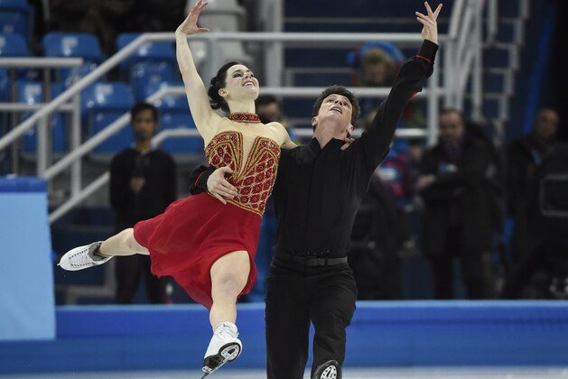Canada's Tessa Virtue and Scott Moir perform their free dance in the ice dance portion of the team figure skating event at the Sochi Winter Olympics Sunday, February 9, 2014 in Sochi. (AP Photo/The Canadian Press, Paul Chiasson)