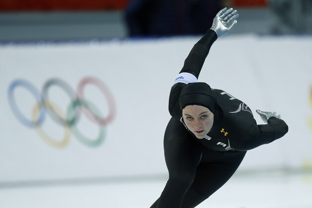 Heather Richardson of the U.S. competes in the women's 1,000-meter speedskating race at the Adler Arena Skating Center during the 2014 Winter Olympics in Sochi, Russia, Thursday, Feb. 13, 2014. (AP Photo/Pavel Golovkin)
