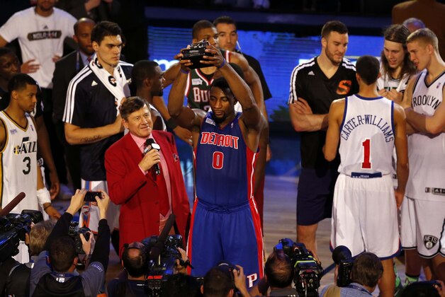 Feb 14, 2014; New Orleans, LA, USA; Team Hill center Andre Drummond (0) holds up the MVP Trophy after Rising Stars Challenge at Smoothie King Center. Mandatory Credit: Derick E. Hingle-USA TODAY Sports