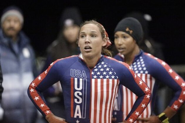 FILE - In this Oct. 25, 2013, photo, Lolo Jones, foreground, and teammate Jazmine Fenlator look up after racing in the U.S. women's bobsled team Olympic trials in Park City, Utah. Jones has gotten ill at the Sochi Olympics. Jones tweeted Monday, Feb. 10, 2014, that she was in a