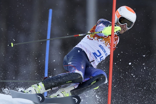United States' Bode Miller makes a turn during the slalom portion of the men's supercombined at the Sochi 2014 Winter Olympics, Friday, Feb. 14, 2014, in Krasnaya Polyana, Russia. (AP Photo/Luca Bruno)
