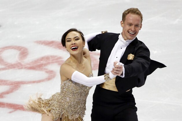 Madison Chock and Evan Bates skate during the ice dance short program at the U.S. Figure Skating Championships in Boston, Friday, Jan. 10, 2014. (AP Photo/Elise Amendola)