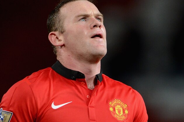 MANCHESTER, ENGLAND - FEBRUARY 09:  Wayne Rooney of Manchester United looks dejected at the end of the Barclays Premier League match between Manchester United and Fulham at Old Trafford on February 9, 2014 in Manchester, England.  (Photo by Michael Regan/Getty Images)
