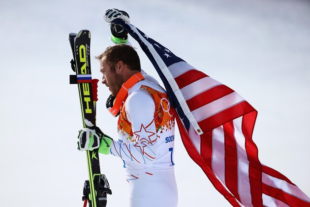 SOCHI, RUSSIA - FEBRUARY 16:  Bronze medalist Bode Miller of the United States reacts during the flower ceremony for the Alpine Skiing Men's Super-G on day 9 of the Sochi 2014 Winter Olympics at Rosa Khutor Alpine Center on February 16, 2014 in Sochi, Russia.  (Photo by Doug Pensinger/Getty Images)