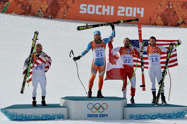 SOCHI, RUSSIA - FEBRUARY 16:  (L-R) Silver medalist Andrew Weibrecht of the United States, gold medalist Kjetil Jansrud of Norway and bronze medalists Jan Hudec of Canada and Bode Miller of the United States celebrate on the podium during the flower ceremony for the Alpine Skiing Men's Super-G on day 9 of the Sochi 2014 Winter Olympics at Rosa Khutor Alpine Center on February 16, 2014 in Sochi, Russia.  (Photo by Pascal Le Segretain/Getty Images)