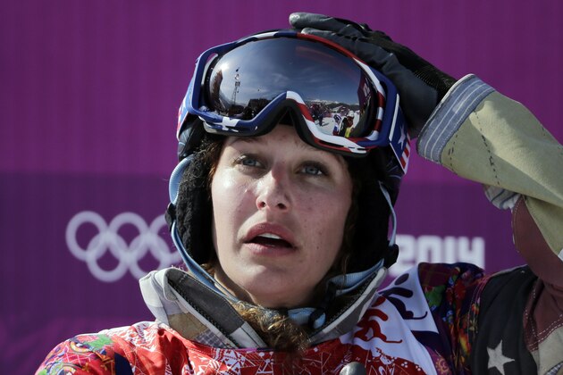 Lindsey Jacobellis  of the United States reacts after winning the small final of the women's snowboard cross at the Rosa Khutor Extreme Park, at the 2014 Winter Olympics, Sunday, Feb. 16, 2014, in Krasnaya Polyana, Russia. (AP Photo/Andy Wong)