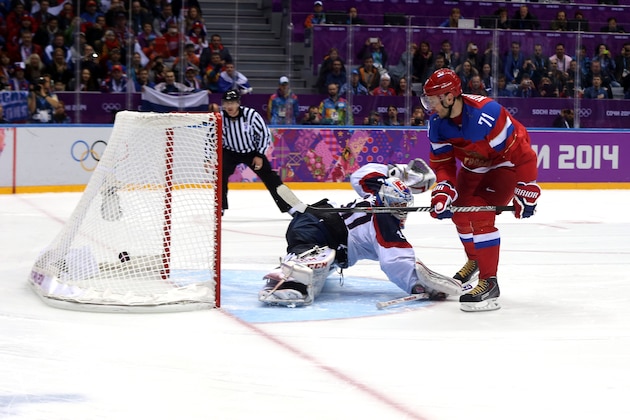 SOCHI, RUSSIA - FEBRUARY 16:  Ilya Kovalchuk #71 of Russia scores a winning goal in a shoot against Jan Laco #50 of Slovakia during the Men's Ice Hockey Preliminary Round Group A game on day nine of the Sochi 2014 Winter Olympics at Bolshoy Ice Dome on February 16, 2014 in Sochi, Russia.  (Photo by Bruce Bennett/Getty Images)