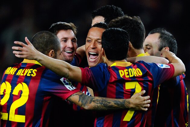 BARCELONA, SPAIN - FEBRUARY 15:  Adriano Correia (C) of FC Barcelona celebrates with his teammates after scoring the opening goal during the La Liga match between FC Barcelona and Rayo Vallecano de Madrid at Camp Nou on February 15, 2014 in Barcelona, Spain.  (Photo by David Ramos/Getty Images)