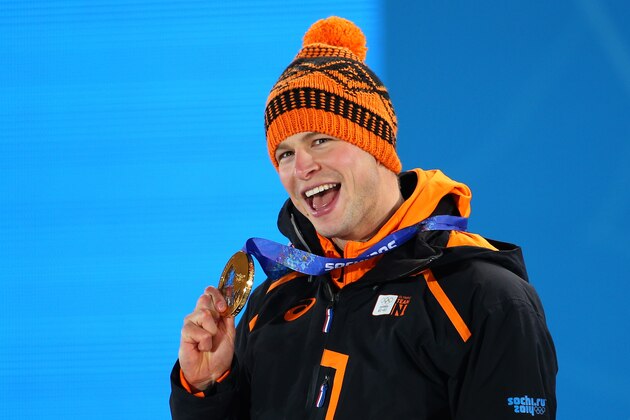 SOCHI, RUSSIA - FEBRUARY 09:  Gold medalist Sven Kramer of the Netherlands celebrates during the medal ceremony for the Men's 5000m Speed Skating on day 2 of the Sochi 2014 Winter Olympics at Medals Plaza on February 9, 2014 in Sochi, Russia.  (Photo by Quinn Rooney/Getty Images)