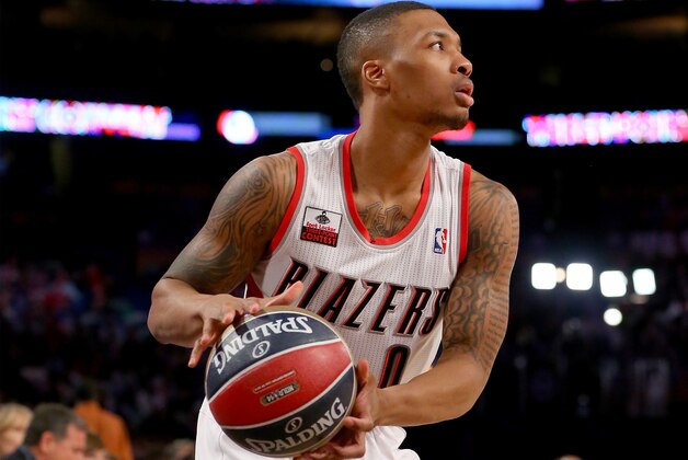 NEW ORLEANS, LA - FEBRUARY 15:  Western Conference All-Star Damian Lillard #0 of the Portland Trail Blazers competes during the Foot Locker Three-Point Contest 2014 as part of the 2014 NBA All-Star Weekend at the Smoothie King Center on February 15, 2014 in New Orleans, Louisiana. NOTE TO USER: User expressly acknowledges and agrees that, by downloading and or using this photograph, User is consenting to the terms and conditions of the Getty Images License Agreement.  (Photo by Ronald Martinez/Getty Images)