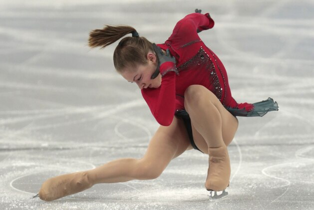 Julia Lipnitskaia of Russia competes in the women's team free skate figure skating competition at the Iceberg Skating Palace during the 2014 Winter Olympics, Sunday, Feb. 9, 2014, in Sochi, Russia. (AP Photo/Ivan Sekretarev)