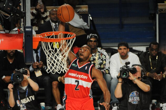 NEW ORLEANS, LA - FEBRUARY 15: John Wall #2 of the Washington Wizards dunks during the Sprite Slam Dunk Contest on State Farm All-Star Saturday Night as part of the 2014 All-Star Weekend at Smoothie King Center on February 15, 2014 in New Orleans, Louisiana. NOTE TO USER: User expressly acknowledges and agrees that, by downloading and/or using this photograph, user is consenting to the terms and conditions of the Getty Images License Agreement.  Mandatory Copyright Notice: Copyright 2014 NBAE (Photo by Bill Baptist/NBAE via Getty Images)
