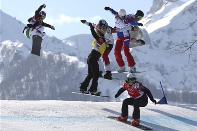 ADDS IDS OF OTHER BOARDERS - Czech Republic's Eva Samkova, bottom right, leads the field in the women's snowboard cross final at the Rosa Khutor Extreme Park, at the 2014 Winter Olympics, Sunday, Feb. 16, 2014, in Krasnaya Polyana, Russia. Samkova went on to win the gold medal. The other boarders are, from left, Italy's Michela Moioli, Bulgaria's Alexandra Jekova, Canada's Dominique Maltais, France's Chloe Trespeuch, and United States' Faye Gulini. (AP Photo/Luca Bruno)