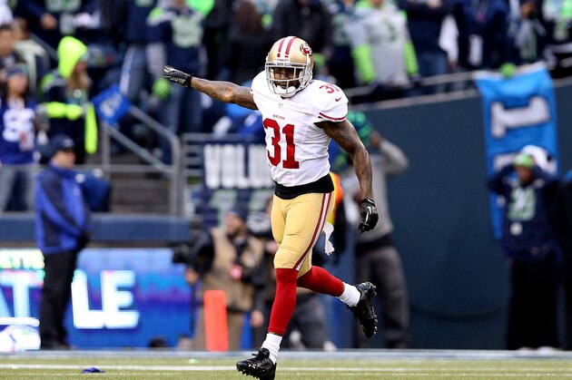 SEATTLE, WA - JANUARY 19:  Strong safety Donte Whitner #31 of the San Francisco 49ers reacts in the first half while taking on the Seattle Seahawks during the 2014 NFC Championship at CenturyLink Field on January 19, 2014 in Seattle, Washington.  (Photo by Christian Petersen/Getty Images)