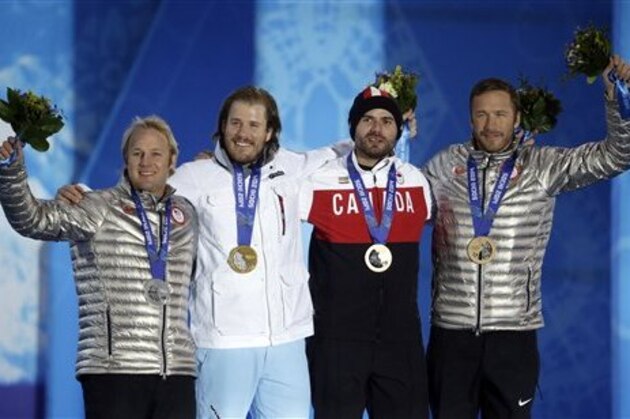 Men's super-G medalists, from left, the United States' Andrew Weibrecht, silver, Norway's Kjetil Jansrud, gold, and Canada's Jan Hudec and the United States' Bode Miller, who tied for the bronze, pose with their medals at the 2014 Winter Olympics in Sochi, Russia, Sunday, Feb. 16, 2014. (AP Photo/Morry Gash)