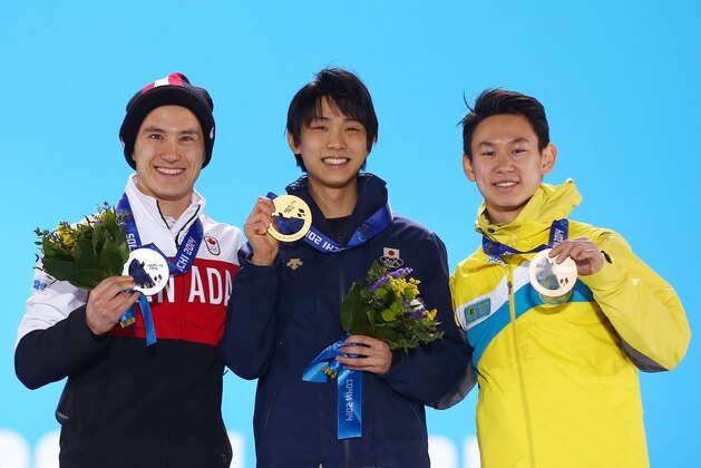 SOCHI, RUSSIA - FEBRUARY 15: (L-R) Silver medalist Patrick Chan of Canada, gold medalist Yuzuru Hanyu of Japan and bronze medalist Denis Ten of Kazakhstan on the podium during the medal ceremony for the MenÂfs Figure Skating on day 8 of the Sochi 2014 Winter Olympics at Medals Plaza on February 15, 2014 in Sochi, Russia. (Photo by Streeter Lecka/Getty Images) SOCHI, RUSSIA - FEBRUARY 15: (L-R) Silver medalist Patrick Chan of Canada, gold medalist Yuzuru Hanyu of Japan and bronze medalist Denis Ten of Kazakhstan on the podium during the medal ceremony for the MenÂfs Figure Skating on day 8 of the Sochi 2014 Winter Olympics at Medals Plaza on February 15, 2014 in Sochi, Russia. (Photo by Streeter Lecka/Getty Images)