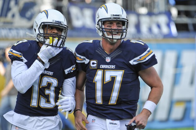 San Diego Chargers quarterback Philip Rivers, right, and wide receiver Keenan Allen jog off the field together after the pair combined on a 43 yard touchdown pass against the New York Giants during the first half of an NFL football game Sunday, Dec. 8, 2013, in San Diego. (AP Photo/Denis Poroy) San Diego Chargers quarterback Philip Rivers, right, and wide receiver Keenan Allen jog off the field together after the pair combined on a 43 yard touchdown pass against the New York Giants during the first half of an NFL football game Sunday, Dec. 8, 2013, in San Diego. (AP Photo/Denis Poroy)