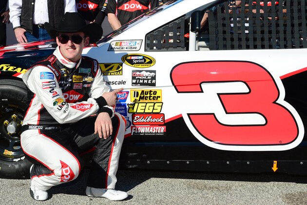Feb 16, 2014; Daytona Beach, FL, USA; NASCAR Sprint Cup Series driver Austin Dillon (3) celebrates winning the pole for the Daytona 500 at Daytona International Speedway. Mandatory Credit: Jasen Vinlove-USA TODAY Sports