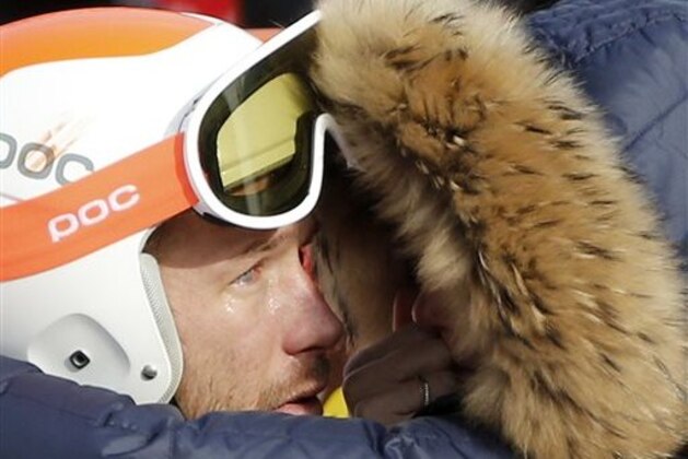 Men's super-G joint bronze medal winner Bode Miller of the United States is consoled by his wife, Morgan, at the Sochi 2014 Winter Olympics, Sunday, Feb. 16, 2014, in Krasnaya Polyana, Russia. (AP Photo/Christophe Ena) Men's super-G joint bronze medal winner Bode Miller of the United States is consoled by his wife, Morgan, at the Sochi 2014 Winter Olympics, Sunday, Feb. 16, 2014, in Krasnaya Polyana, Russia. (AP Photo/Christophe Ena)