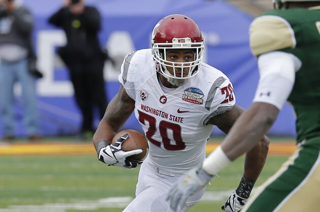 Washington State safety Deone Bucannon (20) runs back an interception during the first half of the NCAA New Mexico Bowl college football game against Colorado State, Saturday, Dec. 21, 2013, in Albuquerque, N.M. (AP Photo/Matt York)