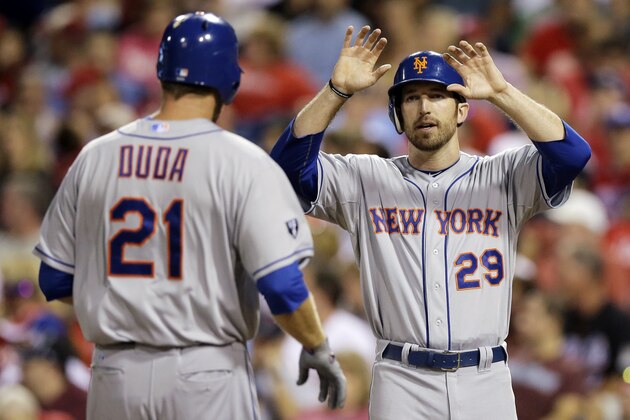 New York Mets' Ike Davis, right, and Lucas Duda celebrate after Duda's two-run home run in the third inning of a baseball game against the Philadelphia Phillies, Wednesday, Aug. 29, 2012, in Philadelphia. New York won 3-2. (AP Photo/Matt Slocum)