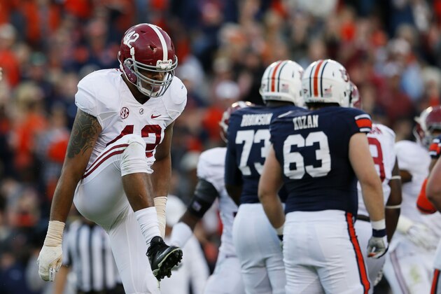 AUBURN, AL - NOVEMBER 30:  Adrian Hubbard #42 of the Alabama Crimson Tide celebrates a second quarter sack against the Auburn Tigers at Jordan-Hare Stadium on November 30, 2013 in Auburn, Alabama.  (Photo by Kevin C. Cox/Getty Images)