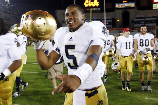 Notre Dame quarterback Everett Golson celebrates after Notre Dame defeated Southern California 22-13 in an NCAA college football game, Saturday, Nov. 24, 2012, in Los Angeles. (AP Photo/Danny Moloshok)