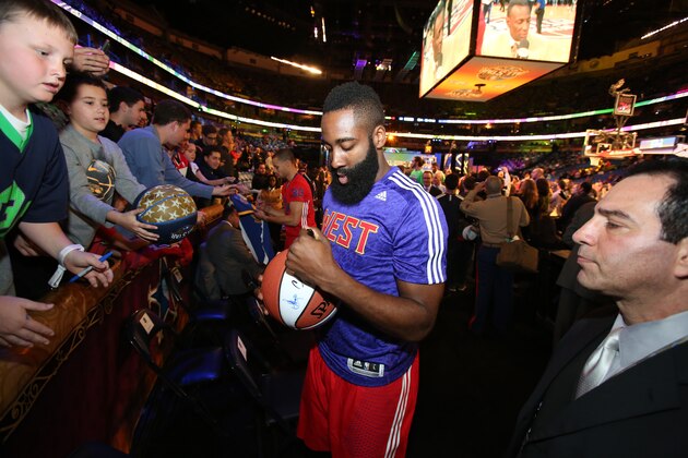 NEW ORLEANS, LA - FEBRUARY 16: James Harden #13 of the Western Conference All-Stars signs autographs during the 2014 NBA All-Star Game on February 16, 2014 at the Smoothie King Center in New Orleans, Louisiana. NOTE TO USER: User expressly acknowledges and agrees that, by downloading and/or using this Photograph, user is consenting to the terms and conditions of the Getty Images License Agreement. Mandatory Copyright Notice: Copyright 2014 NBAE (Photo by Tyler Kaufman/NBAE via Getty Images)