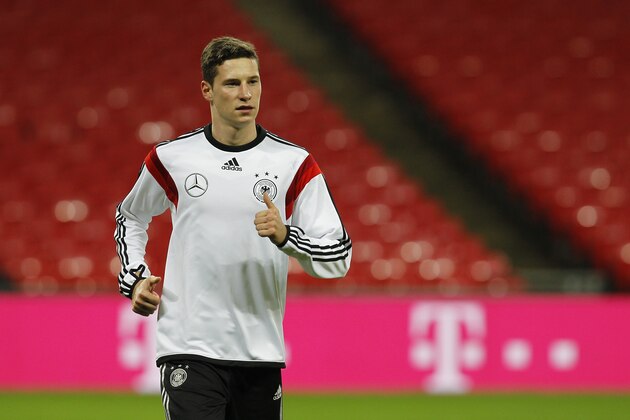 LONDON, ENGLAND - NOVEMBER 18: Julian Draxler of Germany warms up during a training session at Wembley Stadium ahead of their International Friendly against England on November 18, 2013 in London, England. (Photo by Charlie Crowhurst/Getty Images)