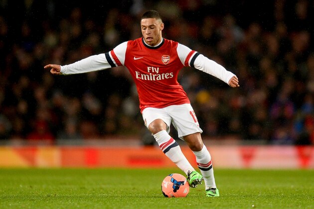 LONDON, ENGLAND - JANUARY 24:  Alex Oxlade-Chamberlain of Arsenal in action during the FA Cup with Budweiser Fourth round match between Arsenal and Coventry City at Emirates Stadium on January 24, 2014 in London, England.  (Photo by Mike Hewitt/Getty Images)