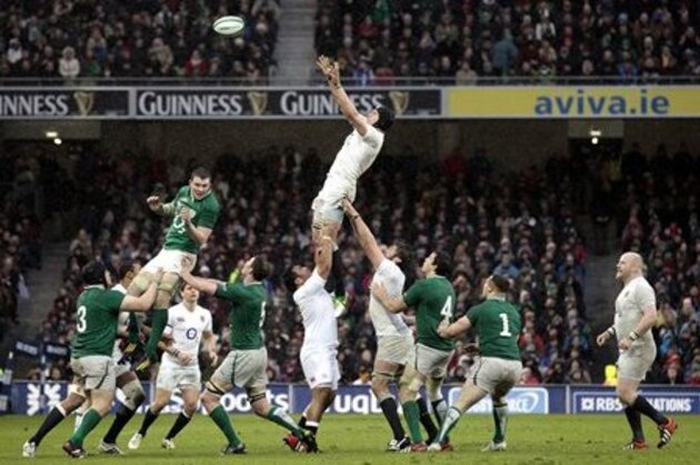 England's Courtney Lawes, center, wins the line out against Ireland during their Six Nations rugby match at the Aviva Stadium, Dublin, Ireland, Sunday, Feb. 10, 2013. (AP Photo/Peter Morrison)