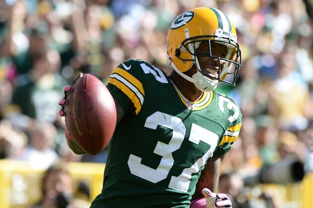 GREEN BAY, WI - OCTOBER 06:  Sam Shields #37 of the Green Bay Packers reacts as he is called for a penalty during the game against the Detroit Lions at Lambeau Field on October 6, 2013 in Green Bay, Wisconsin.  (Photo by Harry How/Getty Images)