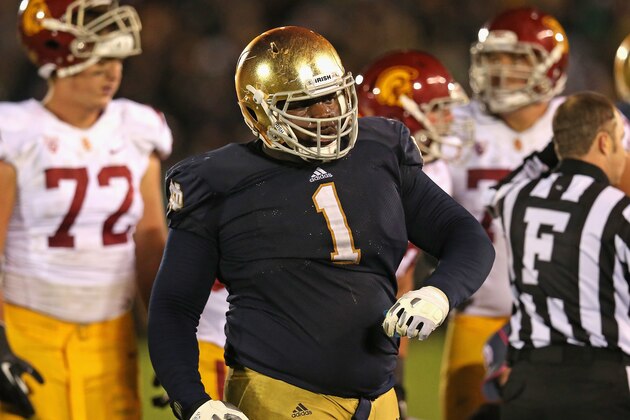 SOUTH BEND, IN - OCTOBER 19:  Louis Nix III #1 of the Notre Dame Fighting Irish celebrates near the end of the game against the University of Southern California Trojans at Notre Dame Stadium on October 19, 2013 in South Bend, Indiana. Notre Dame defeated USC 14-10.  (Photo by Jonathan Daniel/Getty Images)