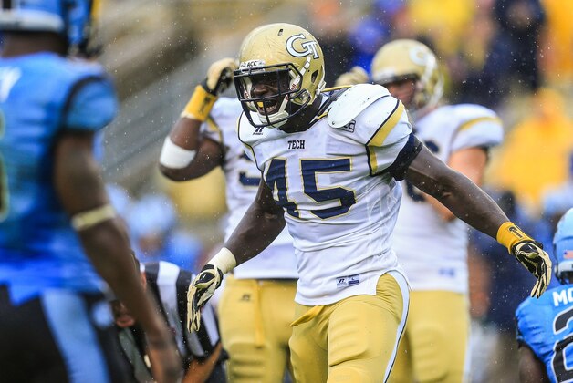 Sep 21, 2013; Atlanta, GA, USA; Georgia Tech Yellow Jackets defensive end Jeremiah Attaochu (45) celebrates a tackle for a loss in the second half against the North Carolina Tar Heels at Bobby Dodd Stadium. Georgia Tech won 28-20. Mandatory Credit: Daniel Shirey-USA TODAY Sports