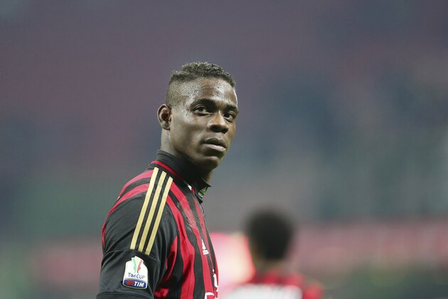 AC Milan forward Mario Balotelli stands during the Italian Cup soccer match between AC Milan and Udinese at the San Siro stadium in Milan, Italy, Wednesday, Jan. 22, 2014. (AP Photo/Antonio Calanni)