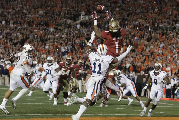 Florida State's Kelvin Benjamin catches the game-winning touchdown pass during the second half of the NCAA BCS National Championship college football game against Auburn Monday, Jan. 6, 2014, in Pasadena, Calif. (AP Photo/Chris Carlson)