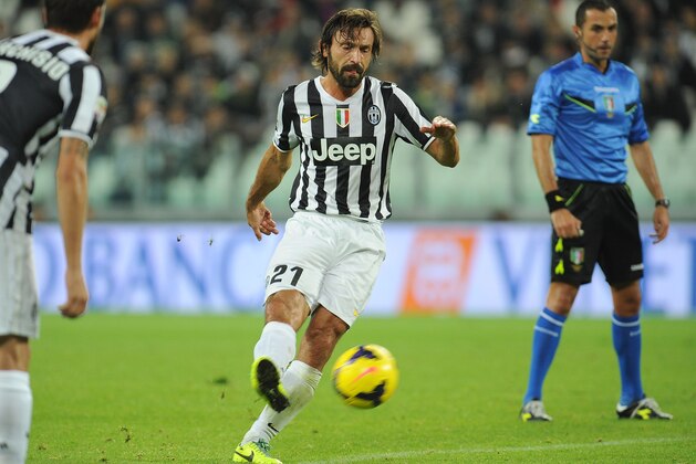 TURIN, ITALY - OCTOBER 30:  Andrea Pirlo of Juventus scores a goal during the Serie A match between Juventus and Catania Calcio at Juventus Arena on October 30, 2013 in Turin, Italy.  (Photo by Valerio Pennicino/Getty Images)