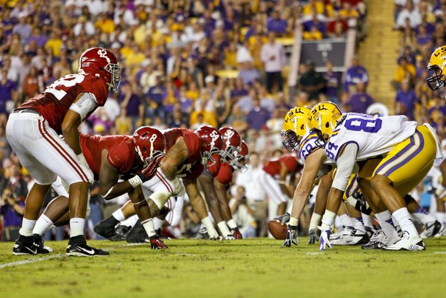 November 3, 2012; Baton Rouge, LA, USA;  The LSU Tigers offense lines up against the Alabama Crimson Tide defense during the first half of a game at Tiger Stadium.  Mandatory Credit: Derick E. Hingle-USA TODAY Sports