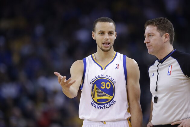 Golden State Warriors' Stephen Curry in action against the Chicago Bulls during an NBA basketball game on Thursday, Feb. 6, 2014, in Oakland, Calif. Golden State won 102-87. (AP Photo/Marcio Jose Sanchez)